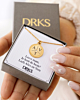 Gouden ketting met 3 initialen in sieradendoosje