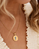 Gouden ketting met voetafdruk