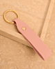 Roze sleutelhanger met gouden ring
