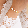 Goudkleurige armband triple parelmoer