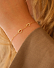 Gouden armband met 2 hartjes