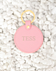 Roze ronde sleutelhanger met initialen