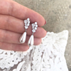 Mooie oorbellen met sparkle en faux pearl als hangers