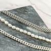Armbanden met parels en schakels