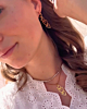 Oorbellen triple heart goudkleurig
