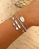 Zilveren armparty met steentjes