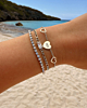 Zilveren armparty met hartje en steentjes