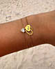Gouden armparty met hartjes