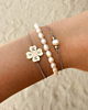 Zilveren armparty met parels