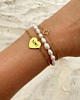 Gouden armparty met gravering