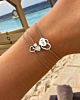 Zilveren armparty met hartjes