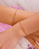 Armbanden met vier hartjes goud