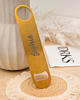 gouden flesopener met naam gegraveerd