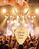 Gouden plectrum sleutelhanger bij concert
