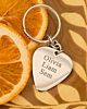 Zilveren sleutelhanger plectrum met gravering