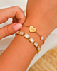 Gouden armbanden mix