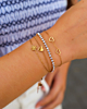 Gouden armparty met hartjes