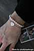 Influencer draagt armband zilver hartje