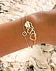 Zilveren armparty met hartjes en bloem