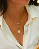 Gouden necklaceparty met hondenpoot