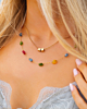 Gouden necklaceparty met initialen en kralen