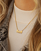 Gouden ketting man vrouw en drie kinderen