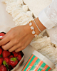 gouden armbanden combinatie
