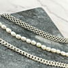 Armbanden met parels en schakels