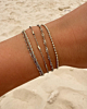 zilveren armparty op het strand