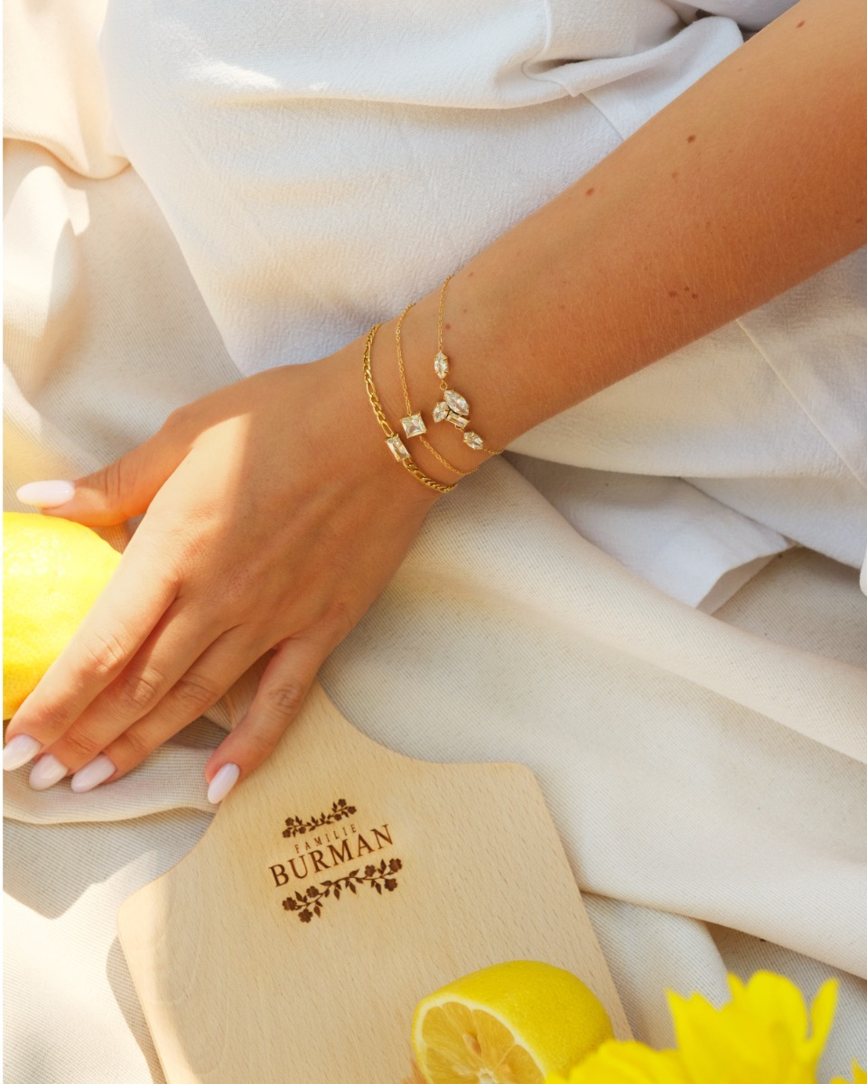 Gouden armbanden met steentjes mix