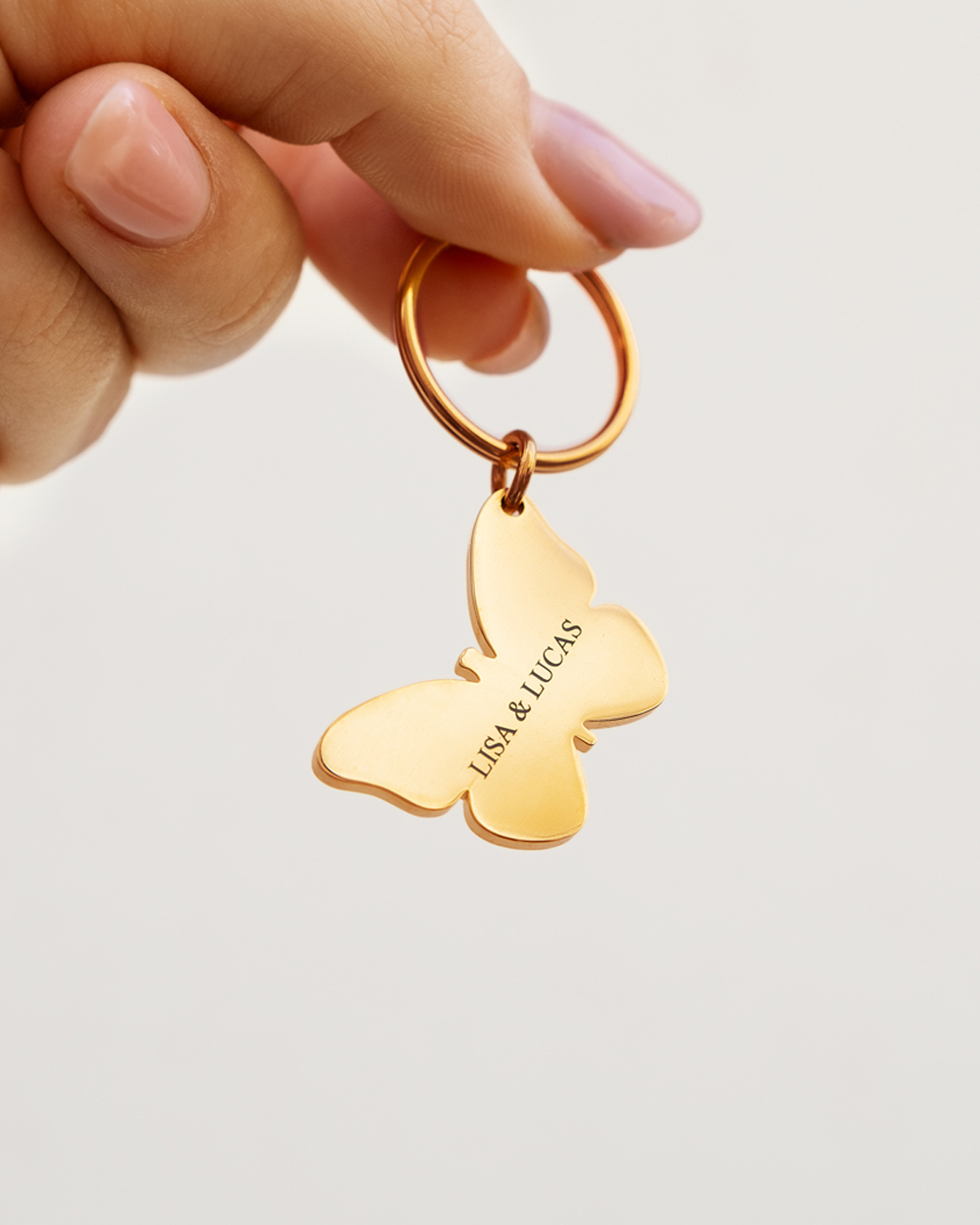 Sleutelhanger met vlinder goud