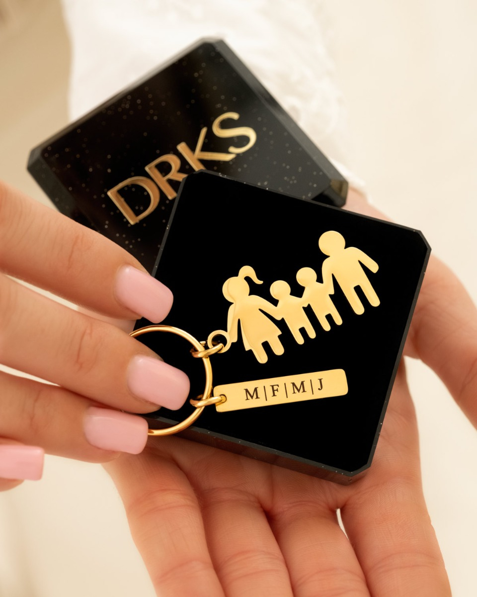 Gouden familie sleutelhanger in doosje
