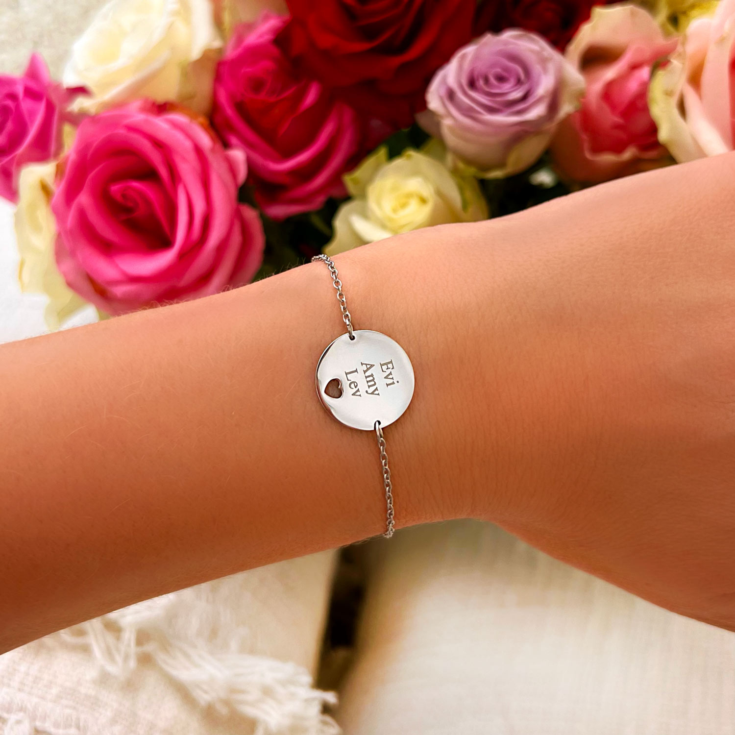 Zilveren armband met namen en hartje