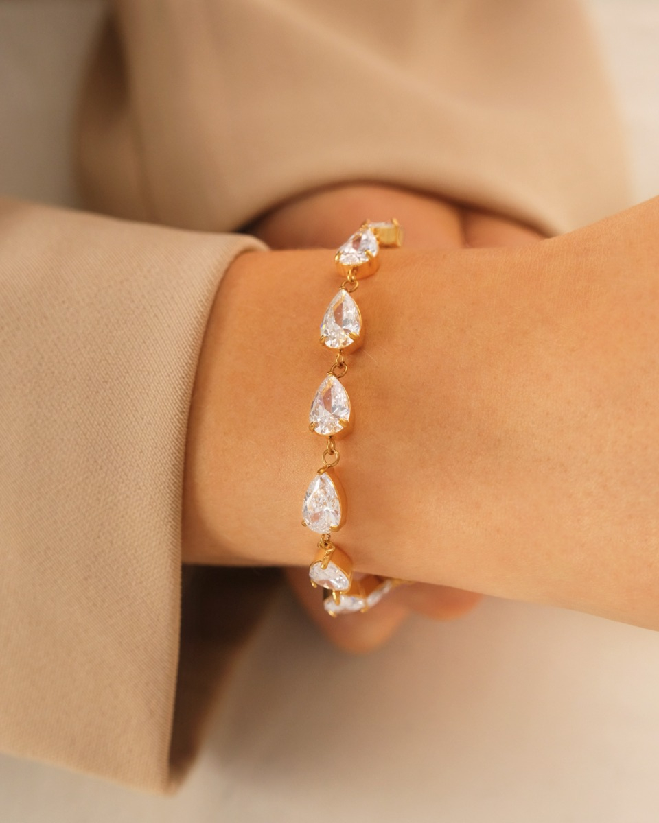 Gouden armband met steentjes