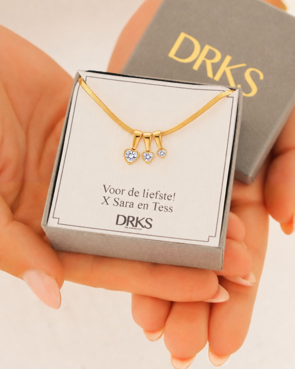 Familieketting met hartjes goudkleurig