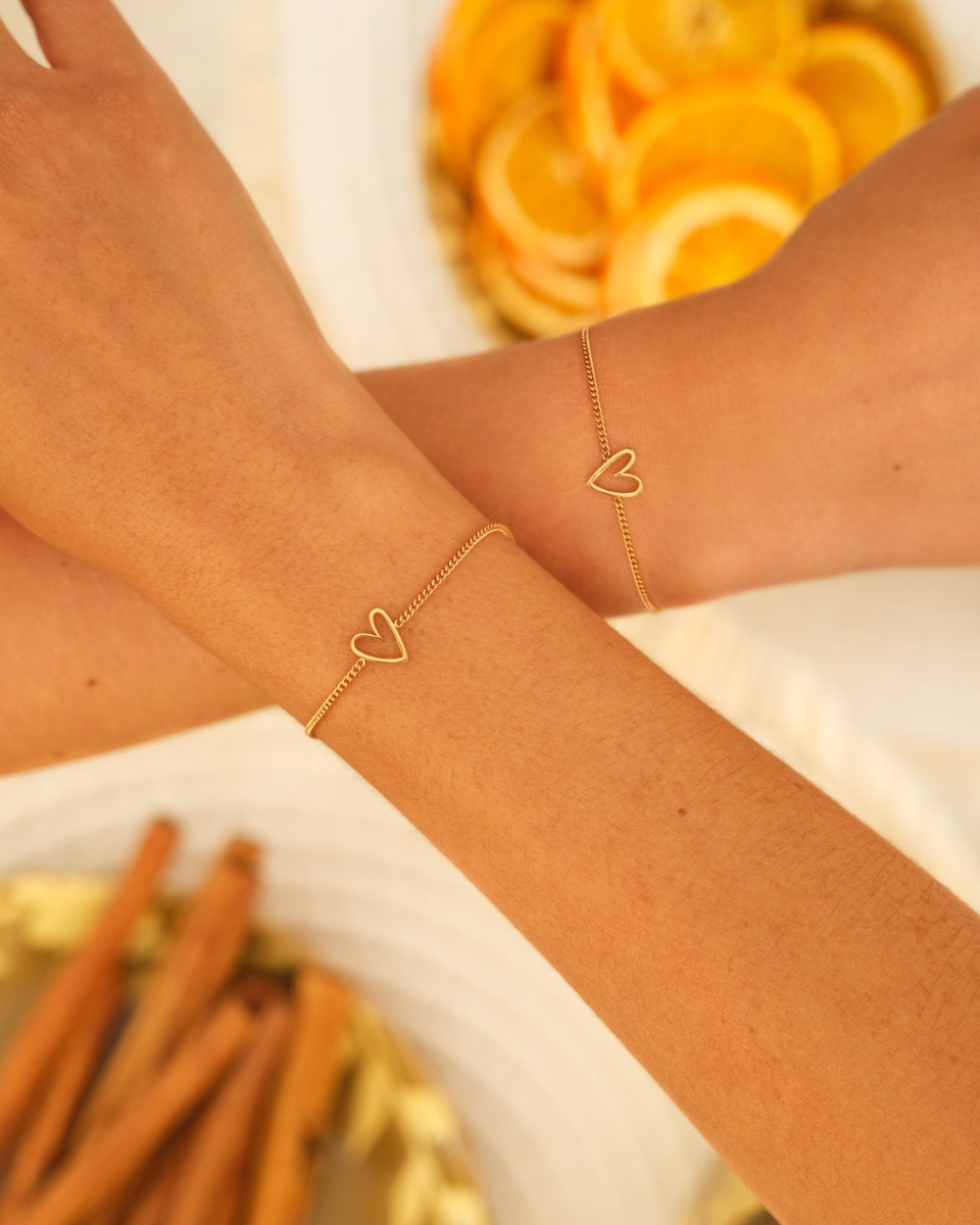 gouden armbanden met een open hartje