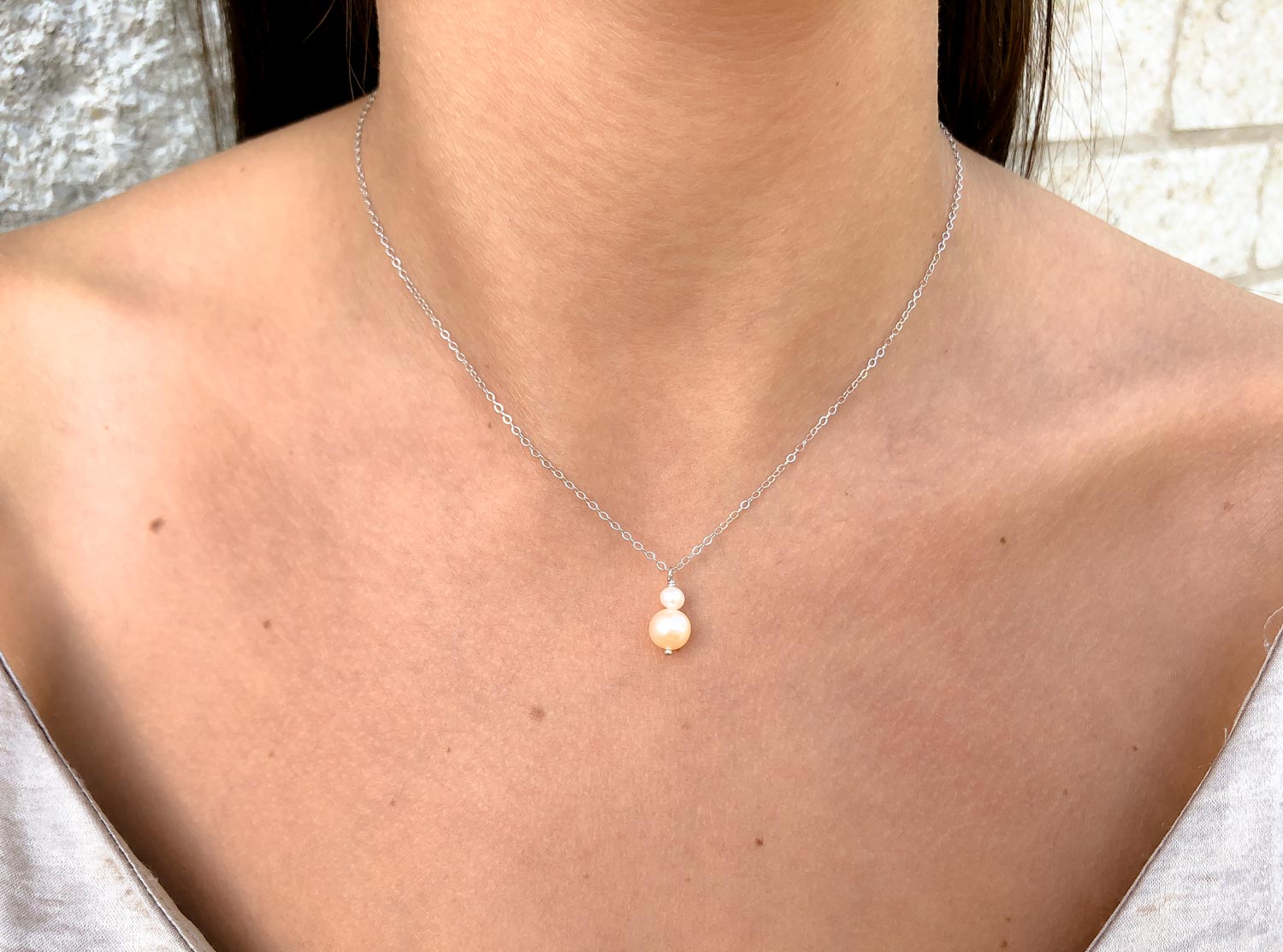 DRKS ketting met peach en ivoor parel in zilver