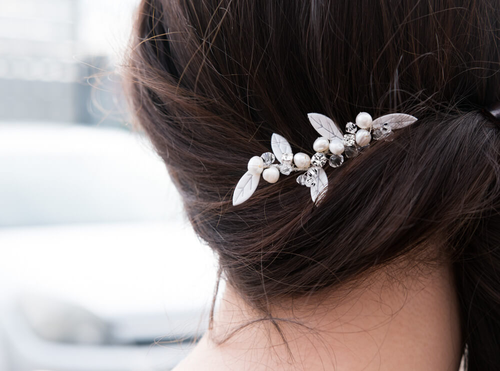 Coco haarpin met blaadjes en parels voor bruid