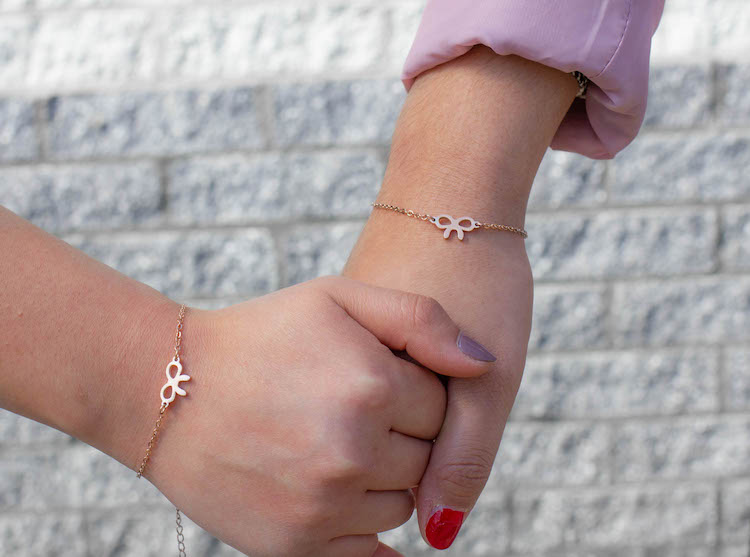 Moeder dochter armbandje in het rose met strikjes