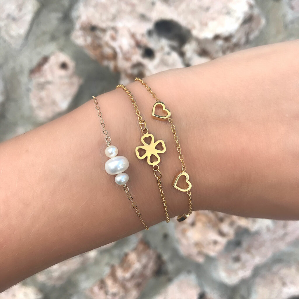 gouden armbanden combinatie