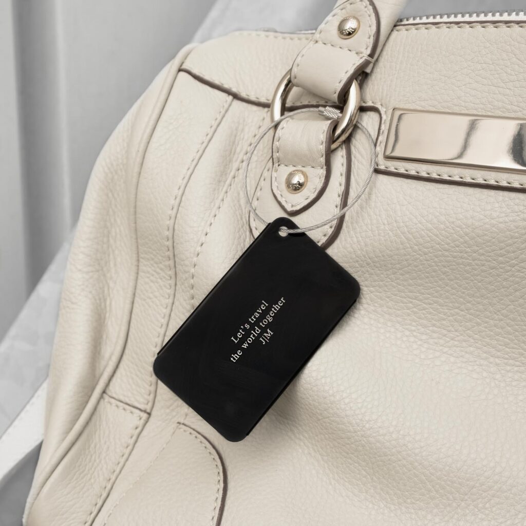 Leuk zwart kofferlabel voor aan de tas