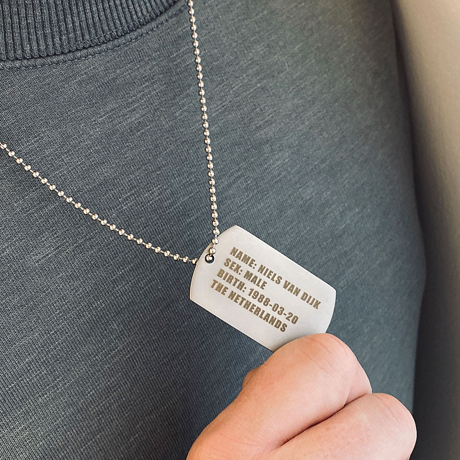 Mannen ketting name tag