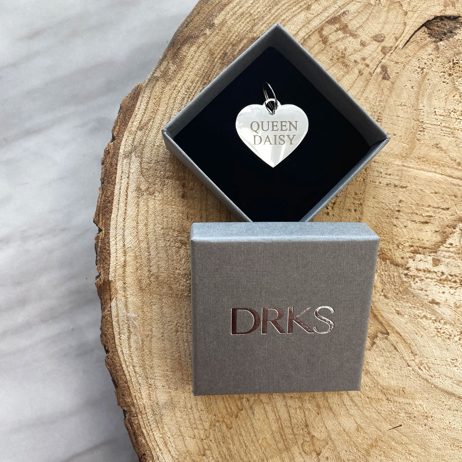 zilveren hondenpenning hartje in doosje