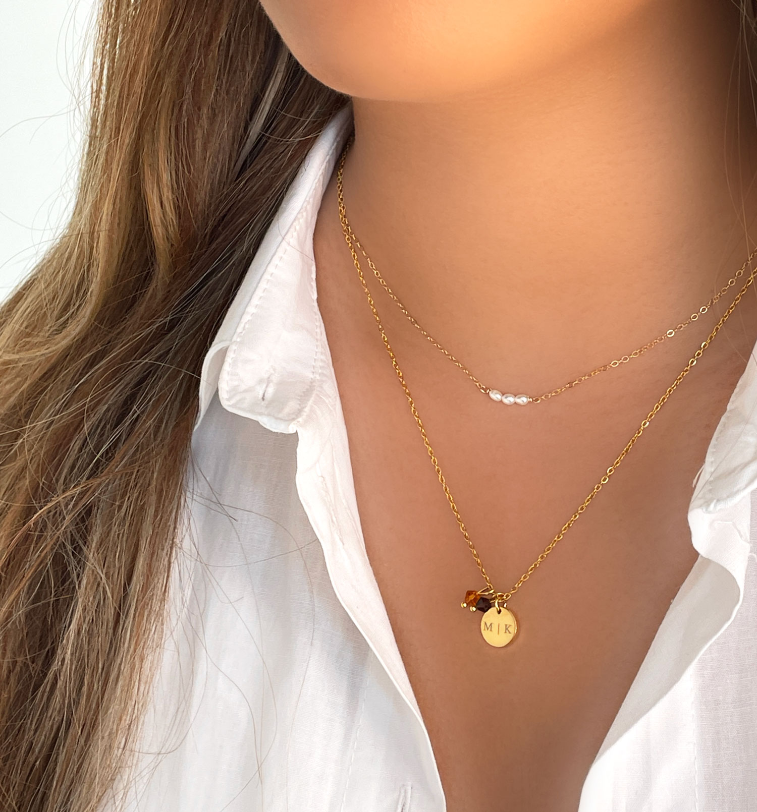 gouden kettingen met pareltjes en birthstones