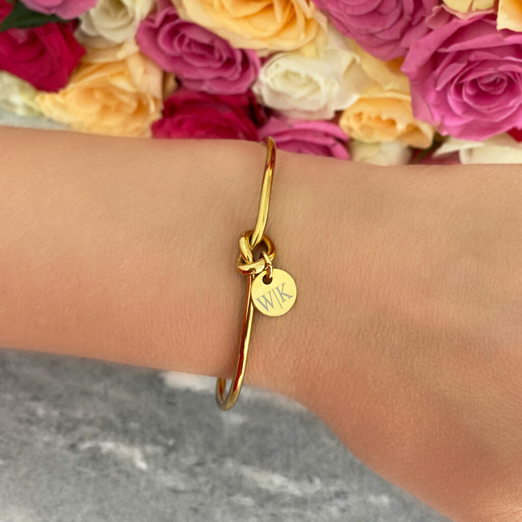 Knoop armband graveerbaar met muntje goudkleurig