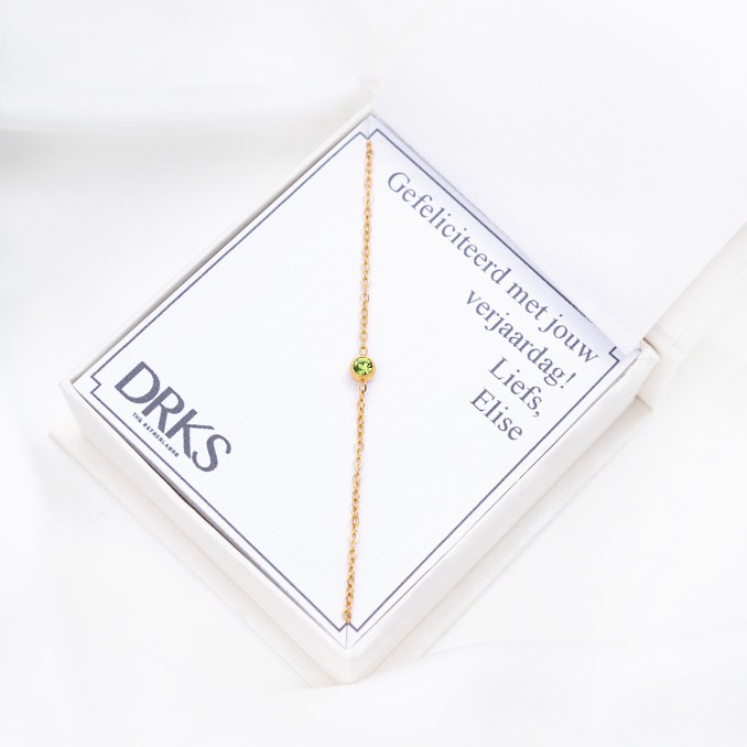 GOUDEN BIRTHSTONE ARMBAND IN DOOSJE 