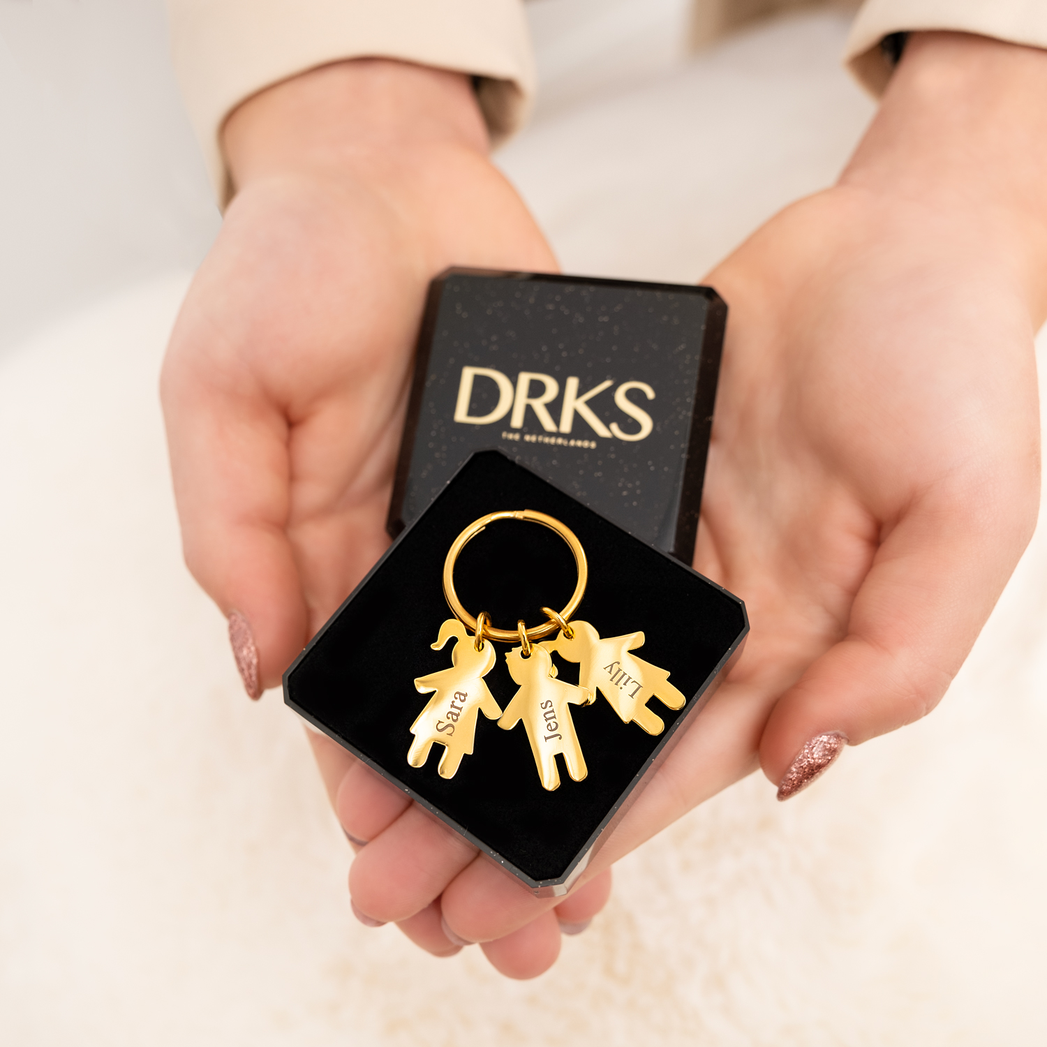 kids sleutelhanger goud